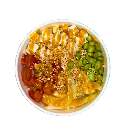 Poke bowl with tofu, mango, edamame and cherry tomatoes