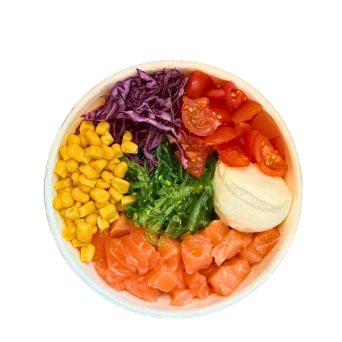 Poke bowl with salmon, corn, red cabbage and wakame seaweed